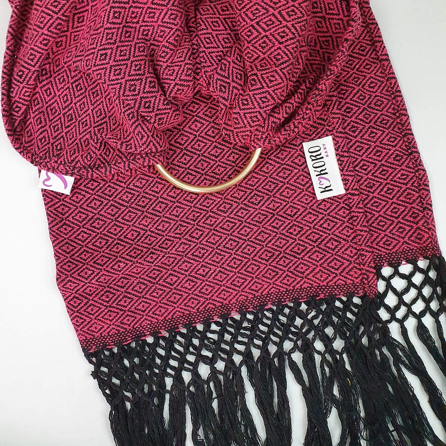 Bandolera tejida en Sarga fucsia negro